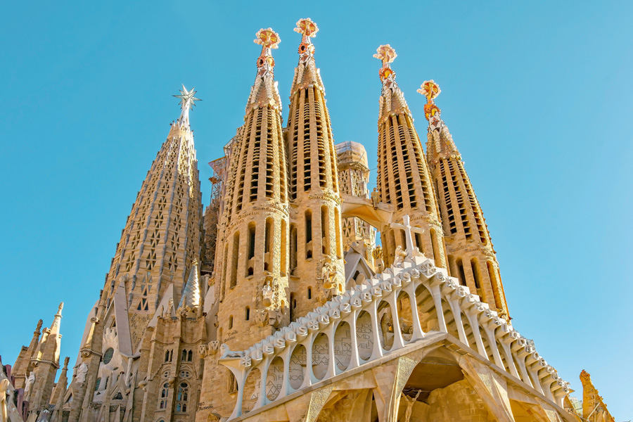 Aerial view of Barcelona with the Sagrada Família and the cityscape in the background.